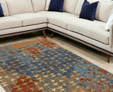 9' X 13' Polypropylene Blue Or Coral Area Rug