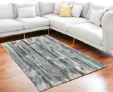 5' X 8' Teal Abstract Brushstrokes Indoor Area Rug